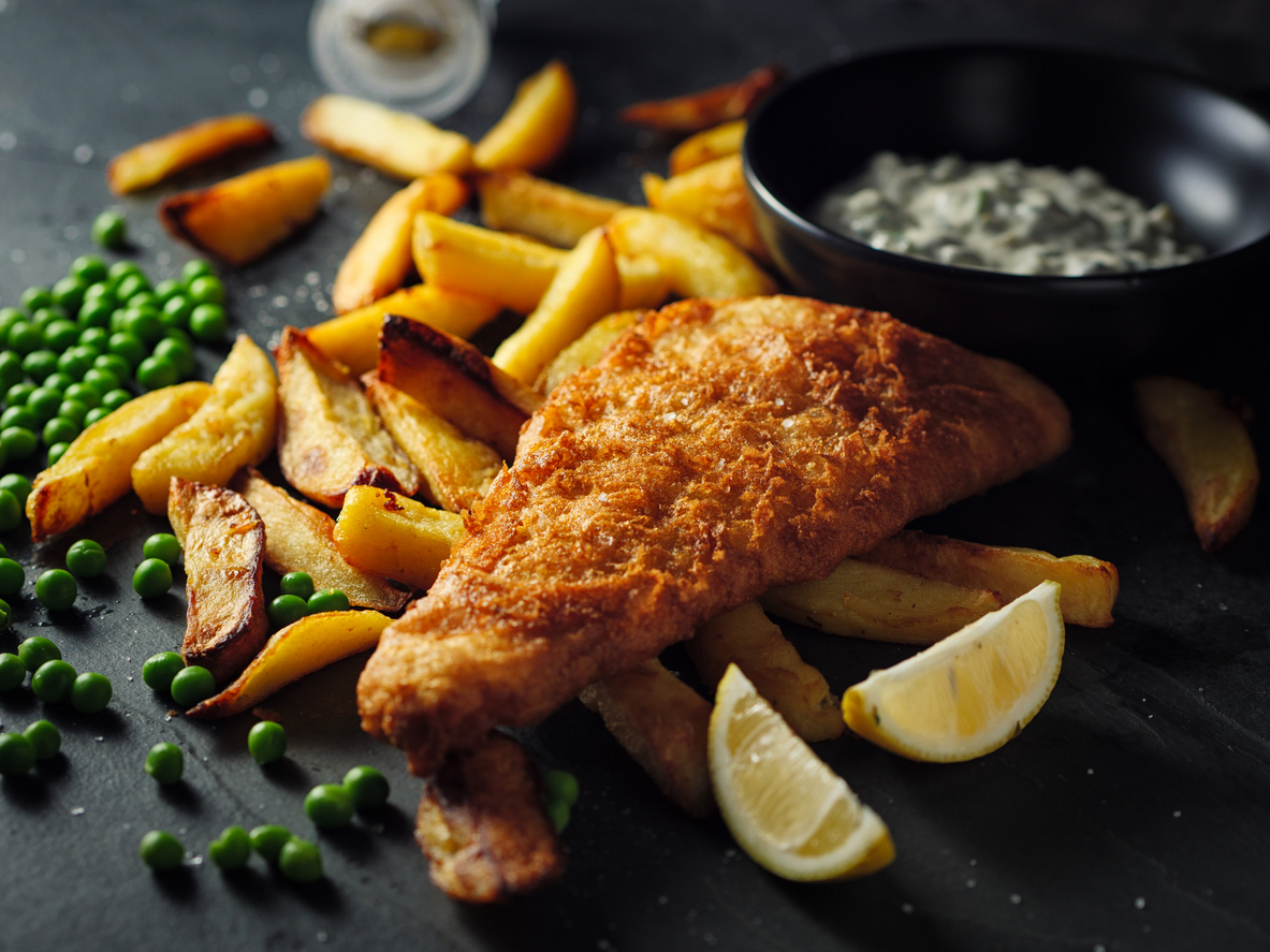 home made Traditional British Dish fish and chips with tartar sauce